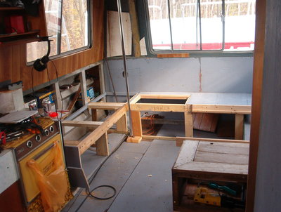 Insulation , corner bracing, wiring, and  paneling.<br />Ruffed in benchs , some from our, old house boat